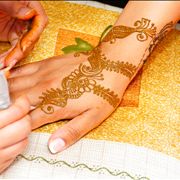 Picture Of Applying Mehndi In Hand