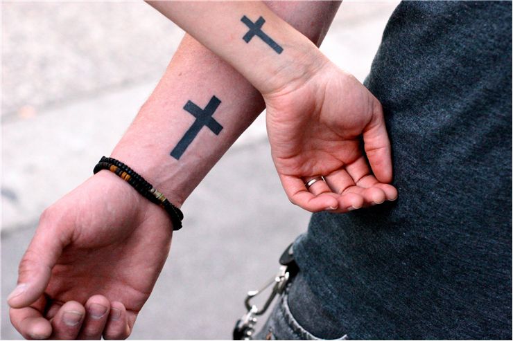 Picture Of Matching Cross Symbol Tattoos